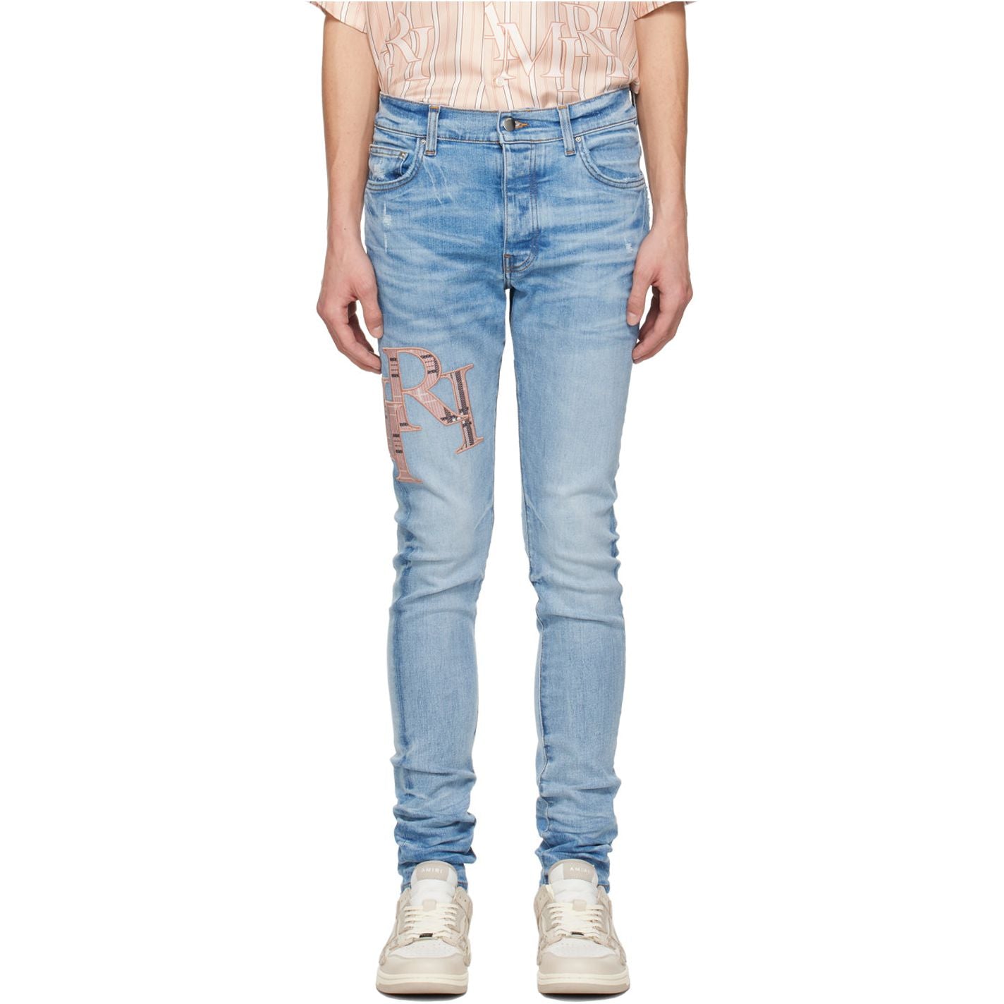 Amiri Indigo Staggered Jeans Tan Lettering